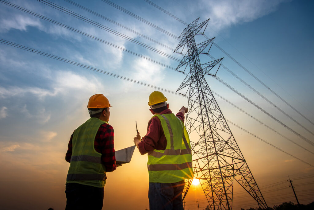 Power lines with workers