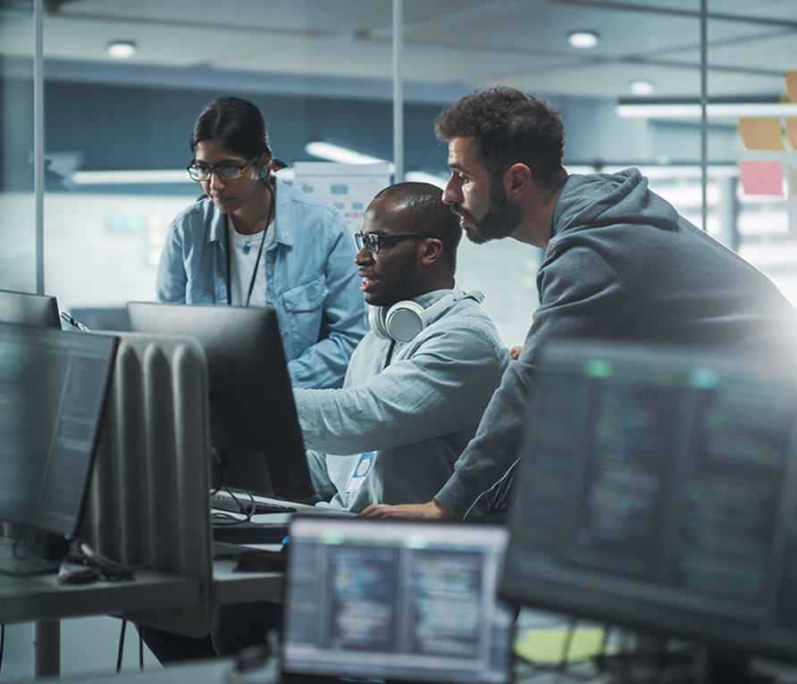 IT pros meeting in a modern office